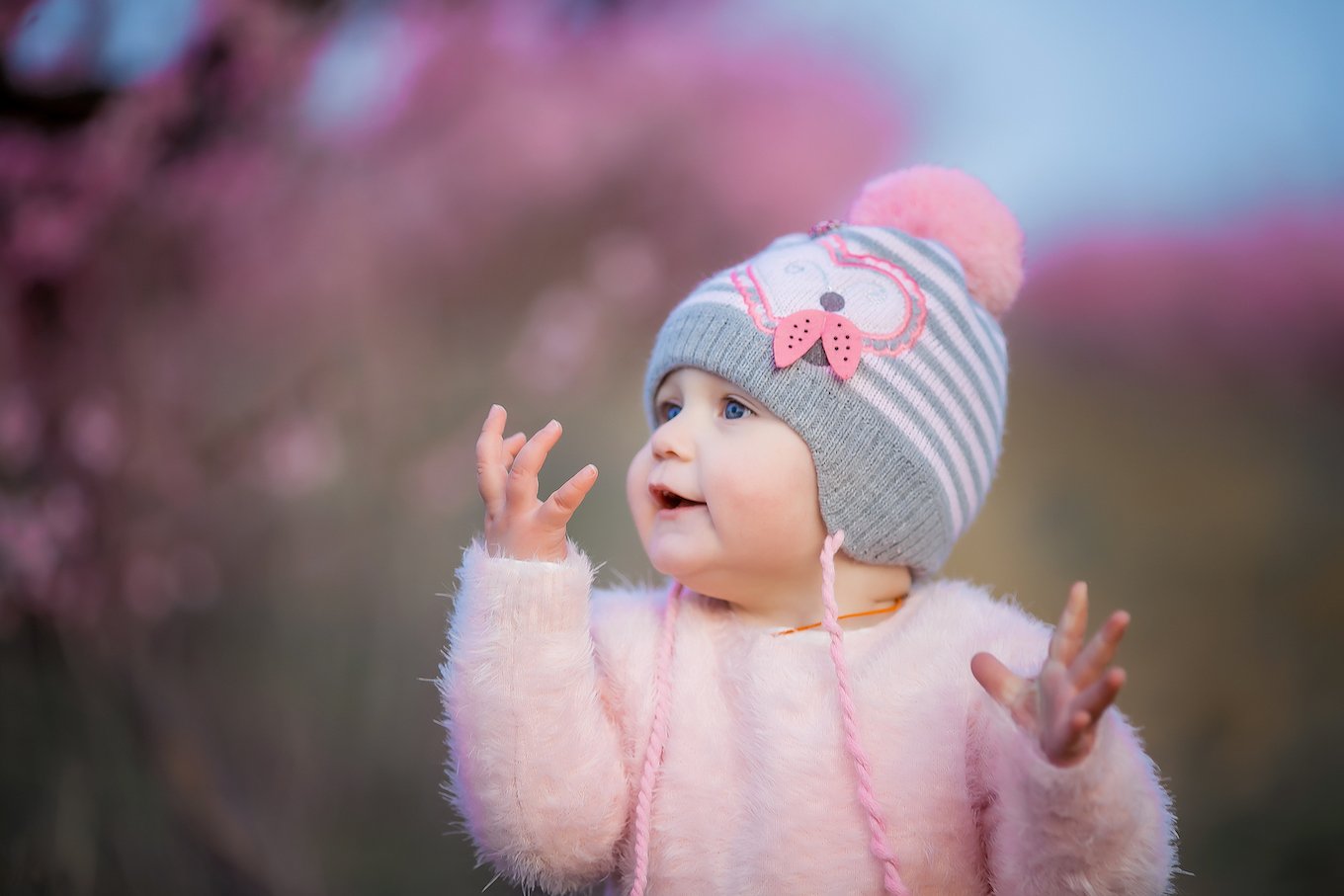 Girl in a pink hat