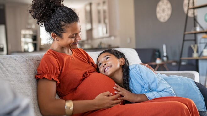 pregnant mom with daughter