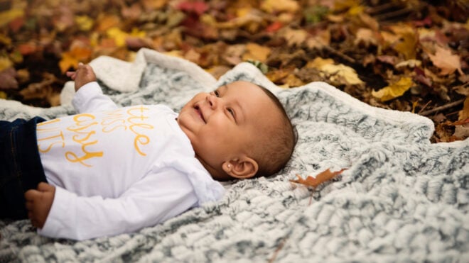 Baby on a blanket outside