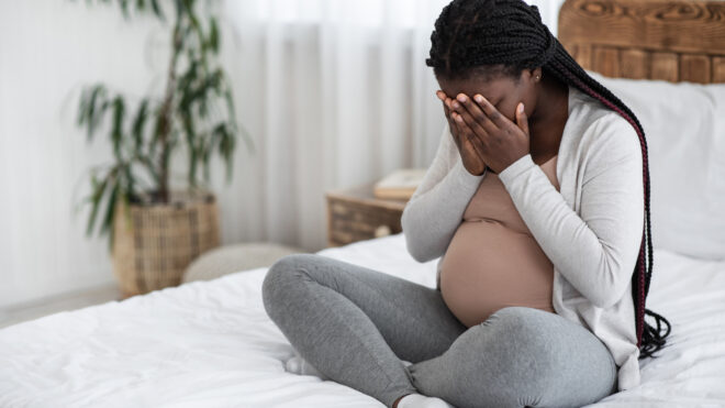 sad pregnant woman