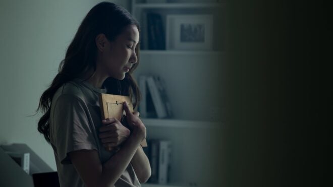 A woman holding a picture