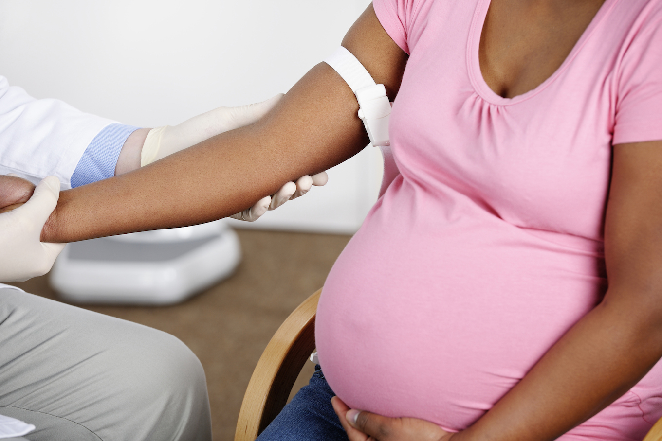 Heavily Pregnant Woman Having A Medical